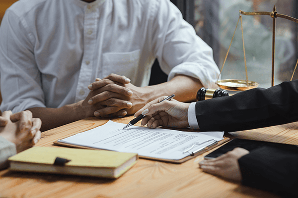 Client meeting about criminal charges in Delta with defence counsel