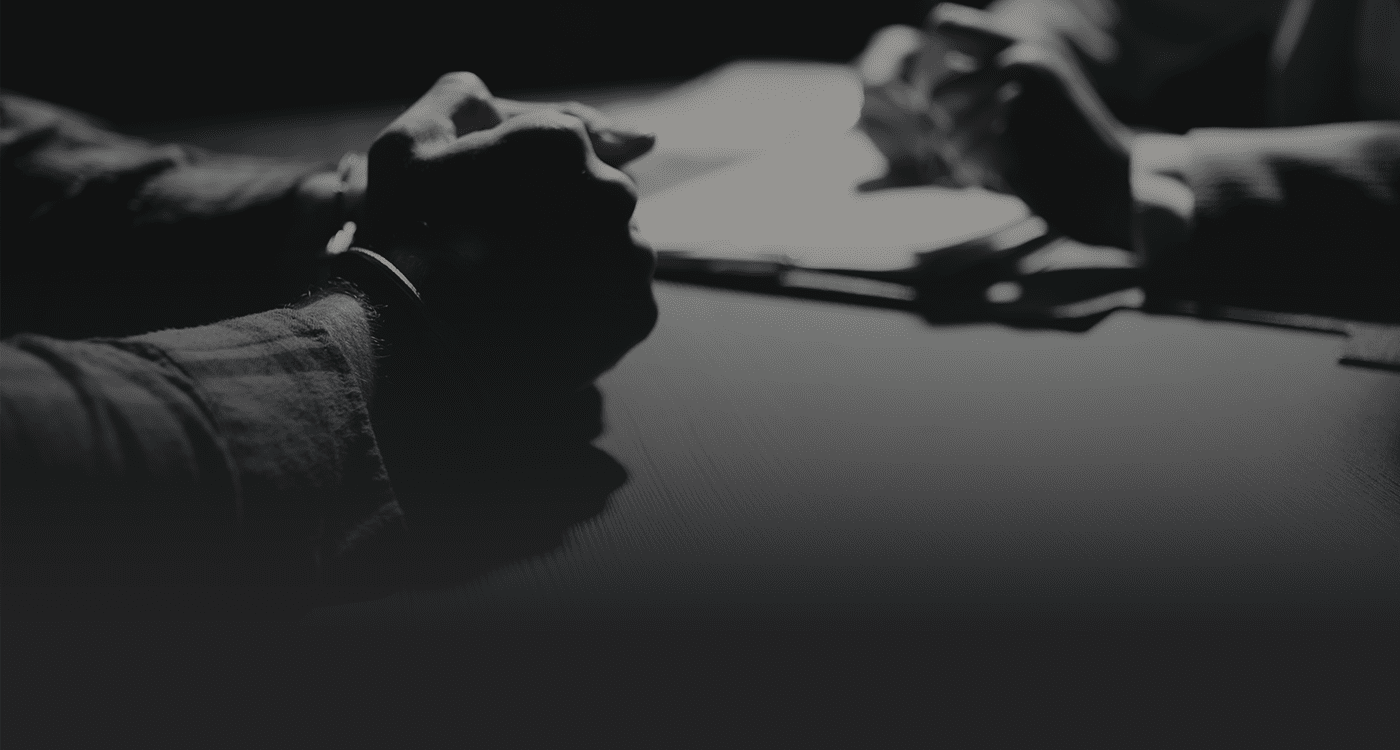 Criminal defense lawyer in Brampton reviewing disclosure with a client