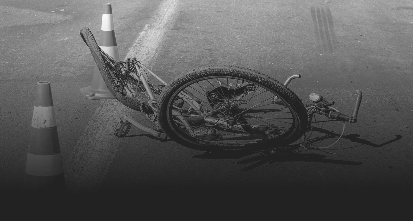 Pedestrian and cyclist injury lawyer in Brampton reviewing a road injury claim with a client